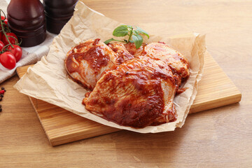 Marinated chicken leg in tomato sauce