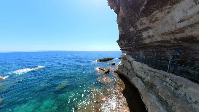 Aerial view of the cliffs on the Bonifacio city and King Aragon steps in Corsica island of France. Drone view of the stairway Escalier du Roy Aragon on Bonifacio bay in the Mediterranean sea.