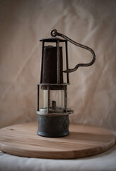 Antique sea lantern covered with rust