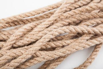 Natural fiber rope on a white background.