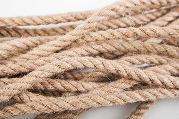 Natural fiber rope on a white background.