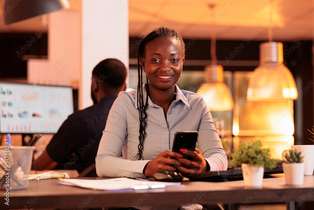 Poster portrait of executive manager using mobile phone with touchscreen, browsing social media app and sit