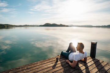 Mature man looking at scenic view from pier