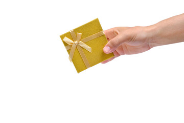 Gift box with gold ribbon and bow in hand white background.