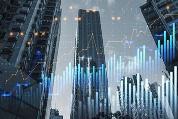 Abstract glowing and growing business graph hologram on blurry city buildings backdrop. Planning...