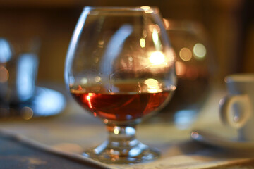 Obraz na płótnie Canvas Brandy or cognac in glass