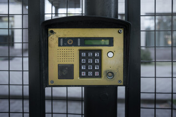 Intercom or door phone is electrical device allowing one-way or two-way communication. Retro golden...
