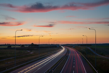 Expressway at dusk,blurred lights of cars