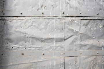 Crumpled steel sheet with peeling and shabby surface background