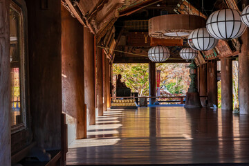 Fototapeta na wymiar 秋の奈良県・長谷寺で見た、厳かな雰囲気の本堂と背景の紅葉