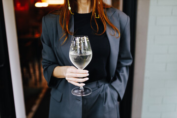 girl with a glass of white wine