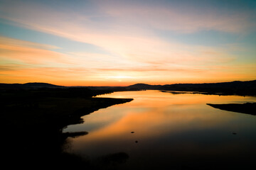 Obraz premium Sunrise over a lake