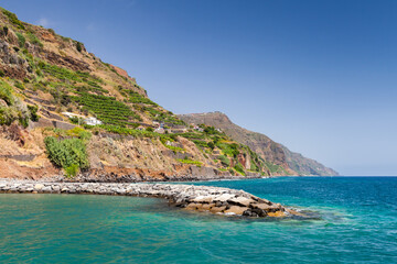 Swimming lagoon protected with stone breakwater