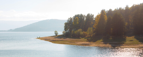 Batak Reservoir dam in autumn, Bulgaria banner view