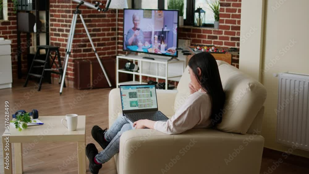 Poster businesswoman analyzing stock market data on laptop while working remotely. financial consultant wor