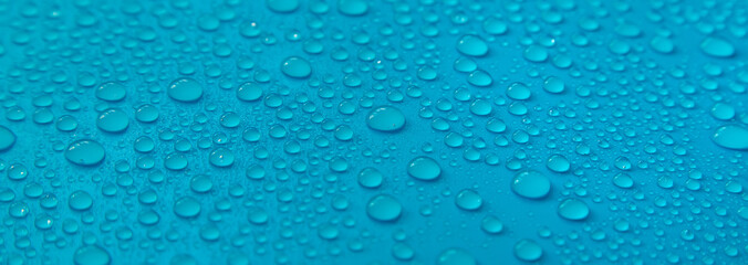 Drops of liquid, moisturizing cosmetic product. Hyaluronic acid. Selective focus.