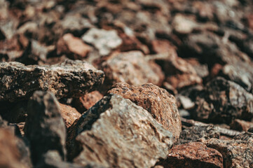 Abstract background texture Small brown stones close-up