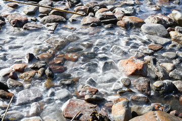 Pebbles and thin ice