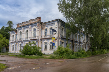 Old building of the former women's gymnasium in the city of Osa (Urals, Russia).
