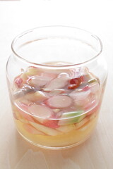 Homemade Japanese young ginger sliced and chili pepper in vinegar for pickles cooking