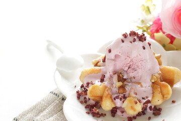 Strawberry ice-cream on Belgium waffle for dessert image