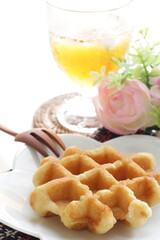 Belgium waffle and iced tea for sweet breakfast 