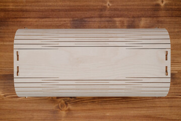Wooden empty box on wooden background. Top view.