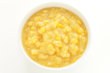 Sweetcorn paste in white bowl for cooking image 