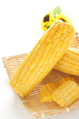 Summer boiled sweet corn, on bamboo basket for healthy food image