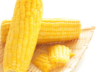 Summer boiled sweet corn, on bamboo basket for healthy food image
