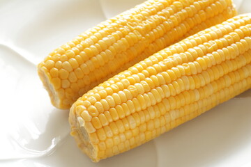Summer boiled sweet corn, on bamboo basket for healthy food image