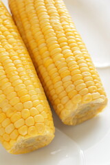 Summer boiled sweet corn, on bamboo basket for healthy food image