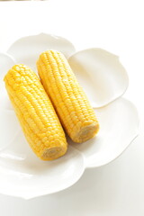 Boiled Japanese sweet corn and cream cheese on French bread toasted for summer healthy breakfast