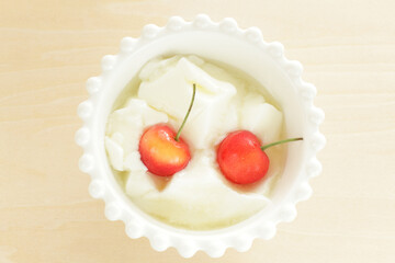 Cherry and Chinese Almond tofu with honey syrup for gourmet dessert