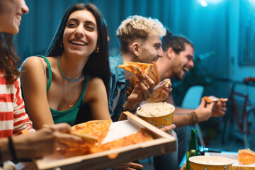 Happy friends watching movies together