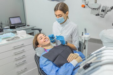 Cheerful woman smiling at the dentist