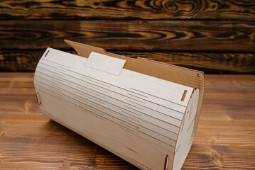 Wooden empty box on wooden background. Top view.