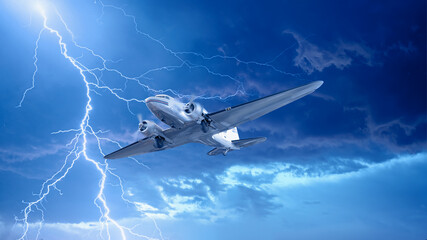 Old metallic propeller airplane in the sky with thunder and lightning