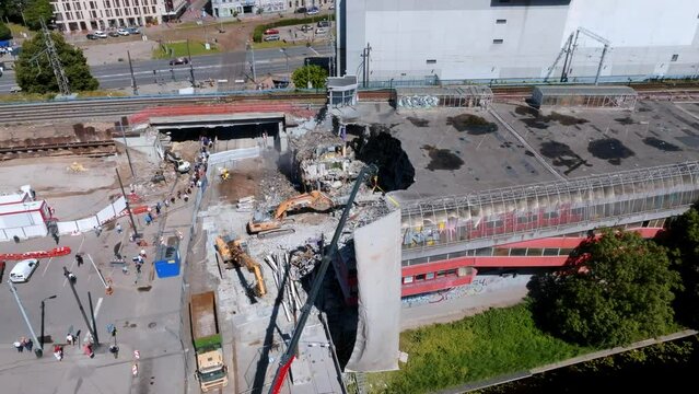 Demolition of the Titanic building in the center of Riga which is a parking lot to prepare for the Rail Baltica train station