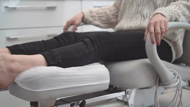 Foot treatment in SPA salon. Patient on medical pedicure procedure