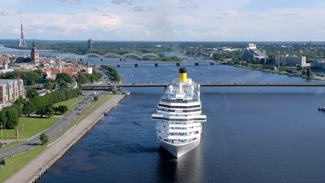 Beautiful cruise ship docked in Riga, Latvia near the old town and the bridge. Cruise in Latvia.