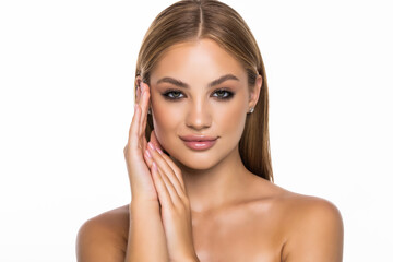 Young woman touching her face isolated on white background. Skincare.