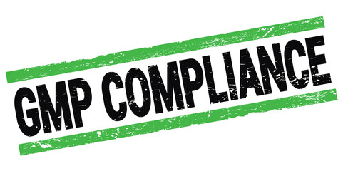 GMP COMPLIANCE text on black-green rectangle stamp sign.