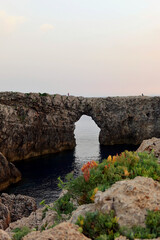 Pont d'en Gil at sunset. Famous Pont d'en Gil at the west coast of Menorca (Minorca), Balearic...