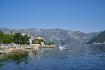 Seaside small village against mountain in Montenegro