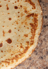 Pan fried pancake as a background.
