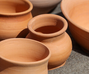 Clay jars at the market for food.