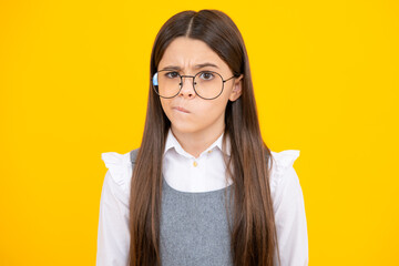 Angry teenager girl, upset and unhappy negative emotion. Emotional adorable little girl surprised and shocked, showing true astonished reaction on unexpected news. Funny teenager child girl face.