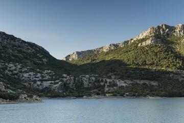Freshwater lake in the mountains on Mallorca island, Spain. Gorg blau reservoir.