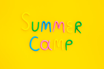 Words Summer Camp made of colorful clay. Summer kids vacation concept